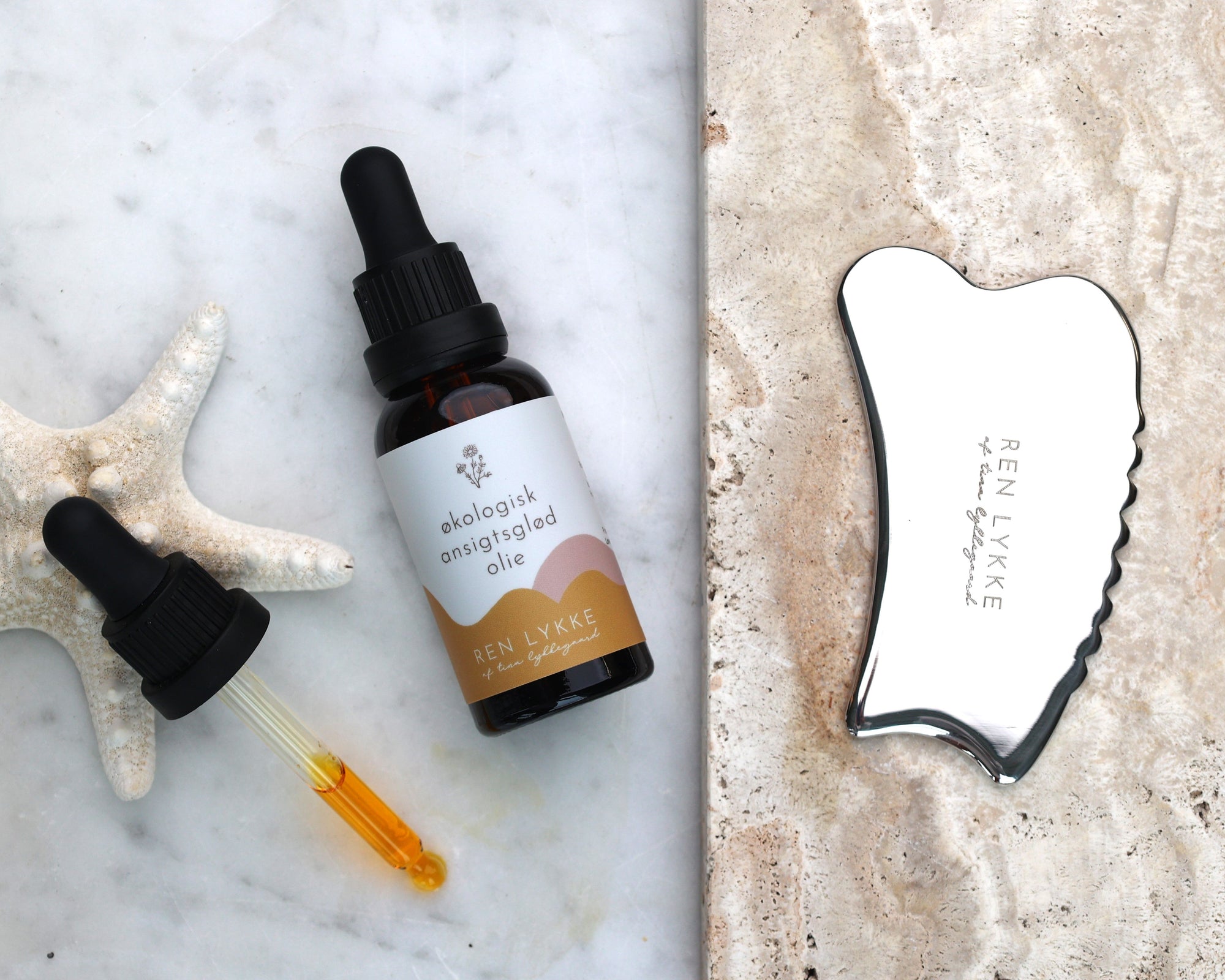 gua sha og ansigtsolie glød